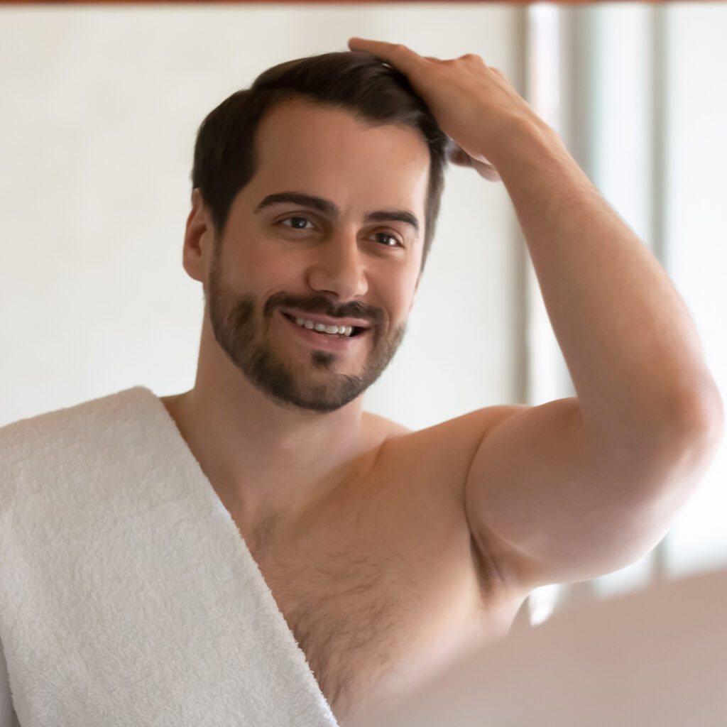 Photo of a happy man with a full head of hair